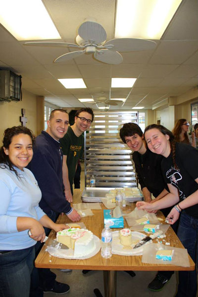 Franciscan Center for Service and Advocacy volunteers serve meals to the homeless and working poor in Philadelphia. 