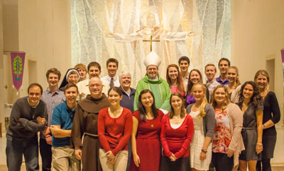Members of Siena's music ministry with Albany Bishop Edward Scharfenberger, D.D.